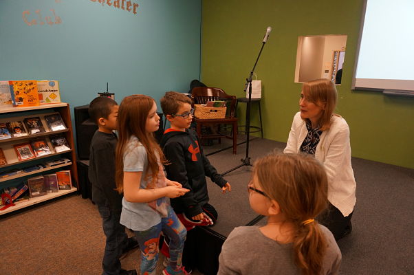 Nancy Loewen talking to kids