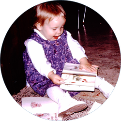 Nancy Loewen as toddler, with books