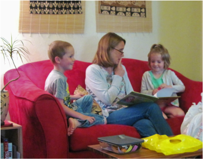 Nancy Loewen reading to young friends